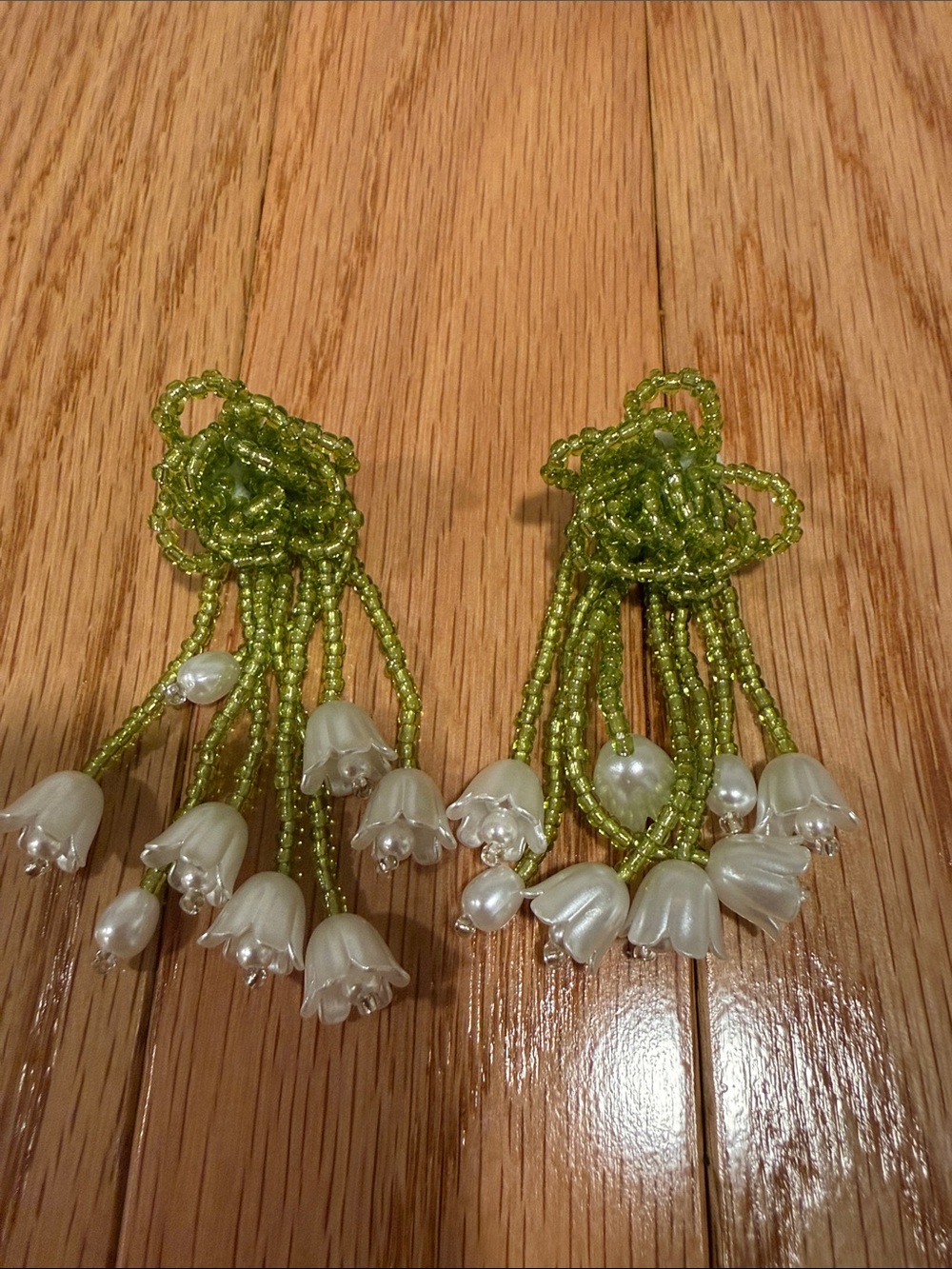 Statement Green Beaded Floral Drop Earrings with Pearl Bell Floral Accents